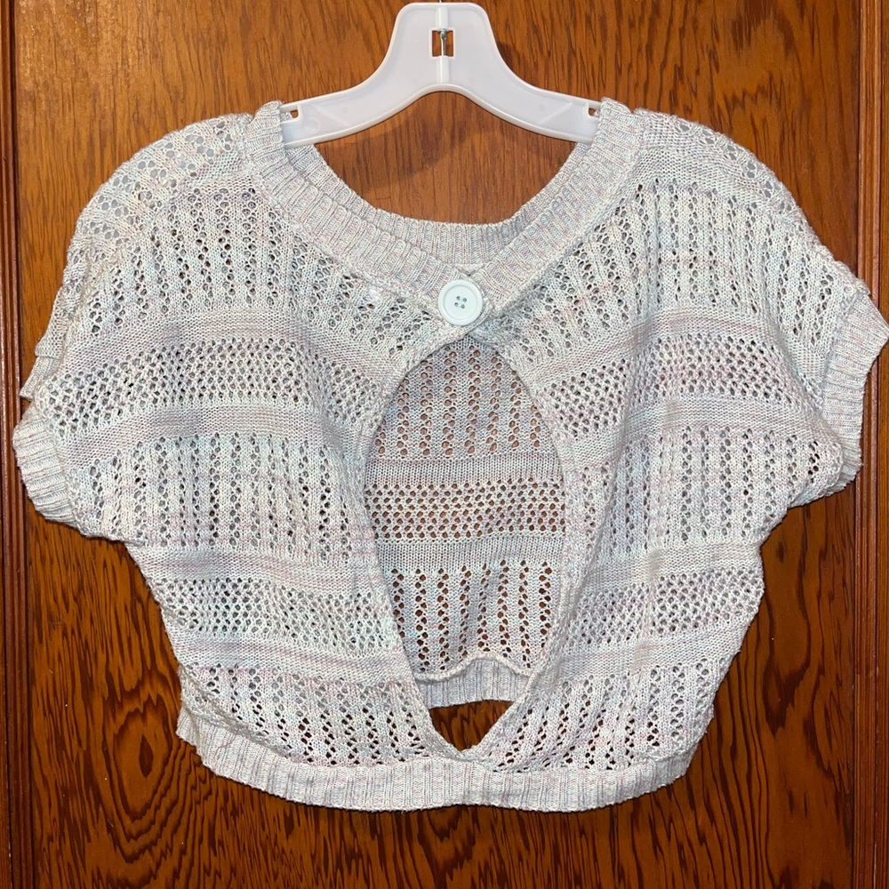 Colorful, knit top with open back